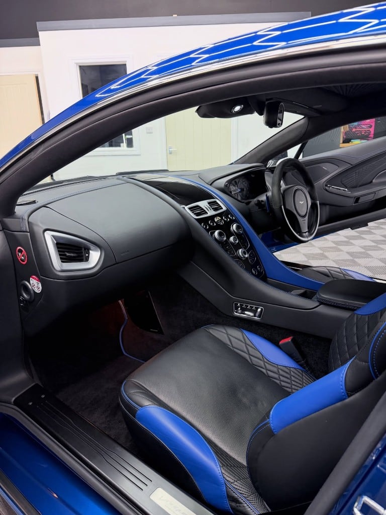 Aston Martin Vanquish blue-and-black interior detailed