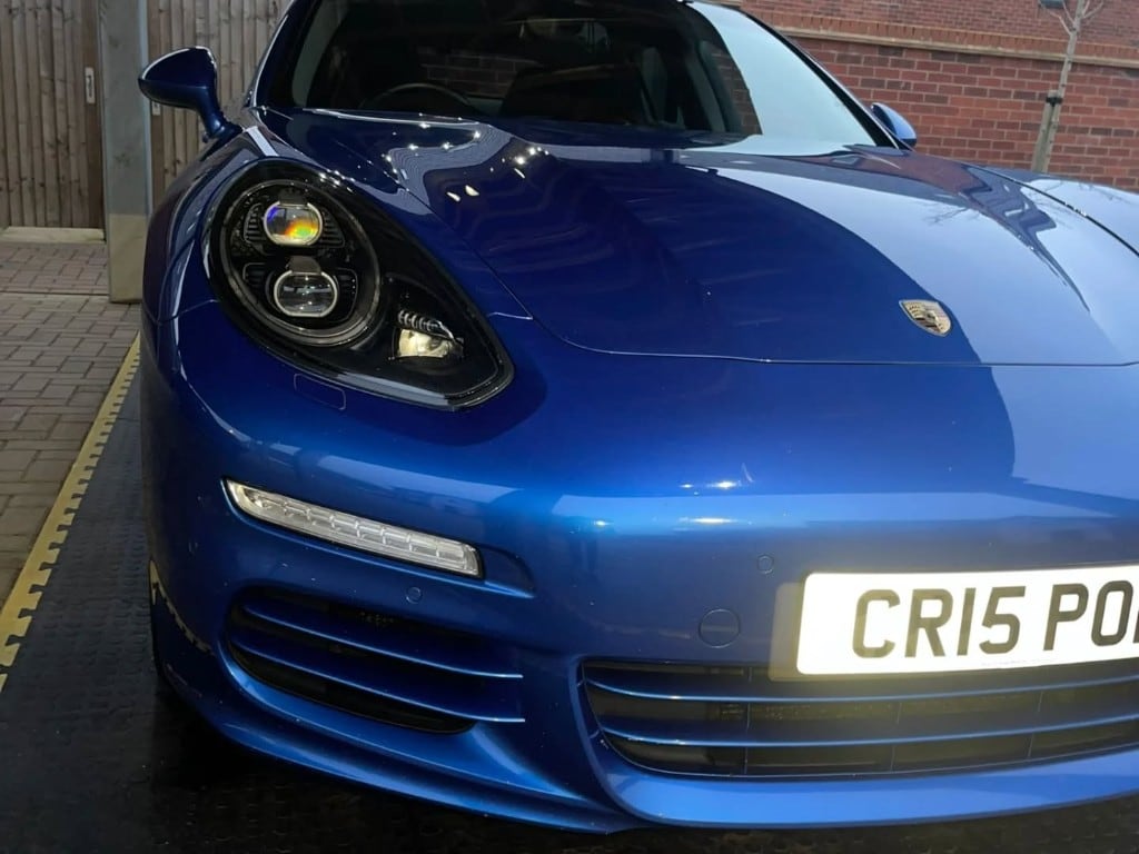 Sapphire blue Porsche Panamera detailed front end